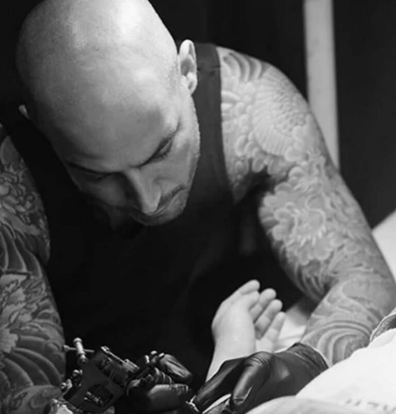 Billy DeCola tattooing, from his years working as a tattoo artist