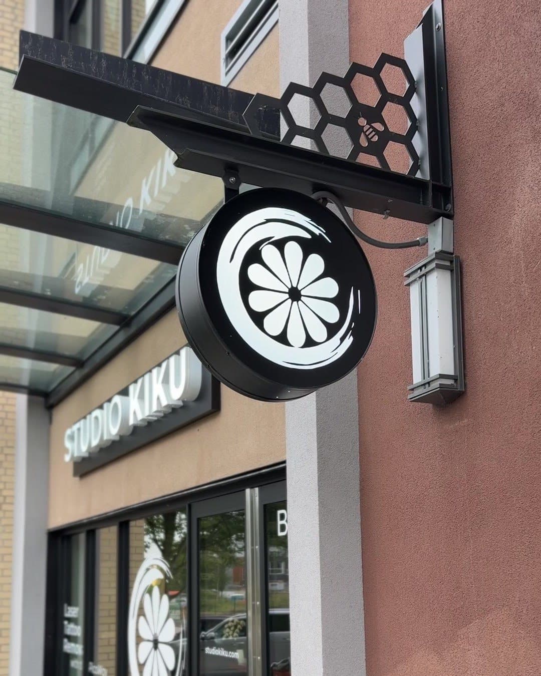 The Studio Kiku sign and storefront at the Langley studio